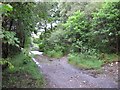 Track of old narrow gauge railway. Ford and footbridge over Allt Coire an Lochain in PH33 6TL