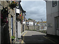 A narrow street in Mousehole in TR19 6SY
