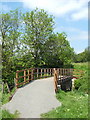 Footbridge crossing a stream in FK4 1GG