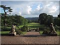 Summer evening view of the gardens of Knightshayes Court in EX16 7QT