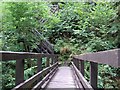 Footbridge over Nant Llech heading towards Henrhyd Waterfall in SA10 9PW