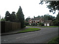 Looking across Tilford Road towards Ridgemoor Close in GU26 6SJ