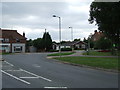 Road junction in IP18 6PX