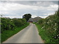 View along Cauldham Lane to Tumble Tye Farm in CT18 7EX