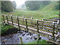 Footbridge across Thursden Brook on The Bronte Way in Briercliffe