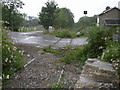 Road crossing disused railway in CF32 8PT