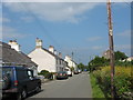 Houses at the eastern end of Hen Bentref Llandegfan in LL59 5YE