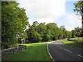 The entrance road to Cae-Ddafydd Farm from the B 5109 in LL77 7LF