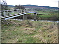 Bridge over River Coquet with Simonside Hills in background. in NE65 7RT