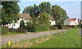 Houses in Alpheton and a stretch of the old road in Alpheton