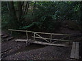Footpath with walkway, bridge and steps in GU27 3DX