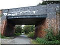 Bridge carrying A34 road, over disused railway line in ST16 3GS